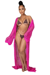Front view of rose pink crochet beach cover-up with open knit mesh and floor-length design