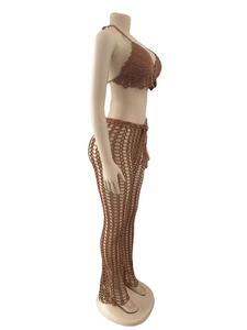 Detailed view of handmade brown crochet two-piece set featuring mesh hollow knit texture
