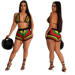 Detailed view of handmade crochet bikini set with colorful red yellow green stripes