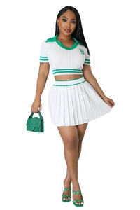 Detail view of white knit polo top with green striped trim and embroidered letter B