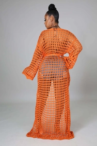 Detailed back view of long orange crochet knit cardigan beach cover-up with waist belt
