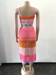 Detail view of colorful crochet two-piece set featuring vibrant boho stripe knit texture