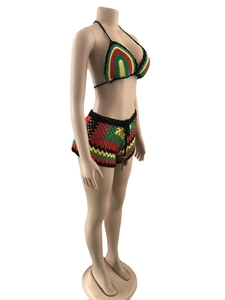 Detail of Rasta color handmade crochet bikini top and shorts with tassel drawstring
