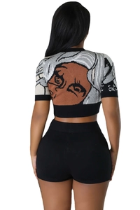 Detailed back view of knit two-piece set featuring artistic portrait jacquard on top
