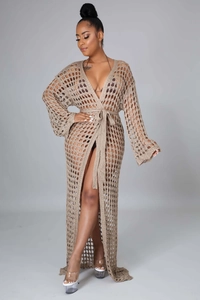 Detail of bohemian khaki crochet beach cover-up featuring hollow-out knit and waist tie