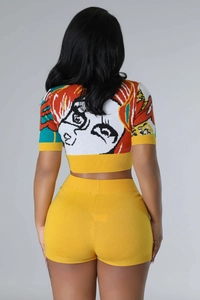 Close-up of vibrant pop art female portrait pattern on back of knit crop top set