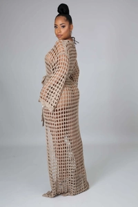 Close-up of the mesh hollow-out knit texture on this stylish khaki beach cover-up cardigan