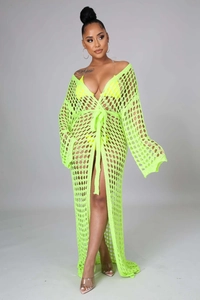 Detail view of neon green crochet long sleeve beach cover-up with tie waist and knit texture