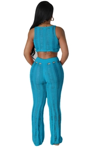 Close-up of sky blue knit two-piece set featuring distressed details and vertical texture