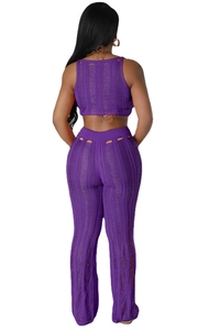 Detail view of purple knit two-piece set featuring distressed texture and crop top