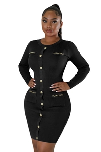 Detail of black ribbed knit dress featuring gold embossed buttons and chain pockets