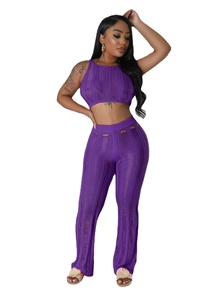Close-up of purple knit set showing detailed hollow-out patterns and ripped texture fabric