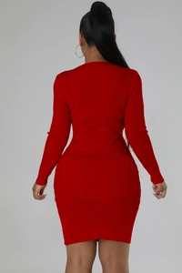 Back view of a red long sleeve ribbed knit dress in a slim fit style for women