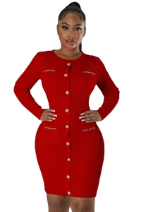 Detail of red knit dress showing gold embossed buttons and metal chain pocket trim