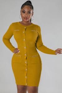 Detail of ginger yellow ribbed knit dress with gold chain pockets and metal buttons