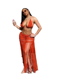 Vibrant orange crochet bikini set with a long fringed beach skirt for women vacation
