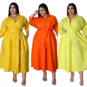 Plus size long sleeve shirt dress in bright yellow, orange, and green colors