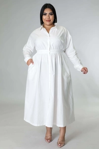 Close-up of a white plus size shirt dress featuring a lapel collar and button-down front