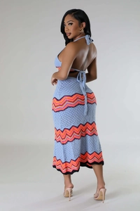 Detail of the light blue crochet knit set with wave patterns and backless halter design
