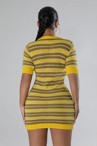 Rear view of slim fit knit dress featuring yellow, dark green, and white stripes