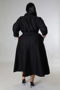 Back view of black long-sleeve plus size shirt dress with cinched waist and tie cuffs