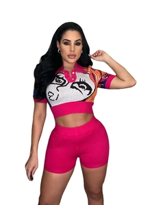 Pink knit set with abstract face jacquard pattern featuring crop top and high waist shorts