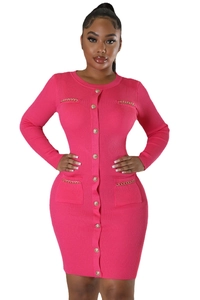 Detail of bright pink knit dress with gold buttons and metal chain pocket trim