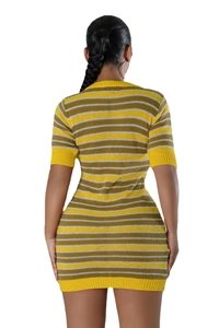 Detail of multi-color striped knitted dress showing slim fit and textured fabric from behind