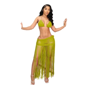 Detailed knit texture and long fringe design of this bright green crochet beach set