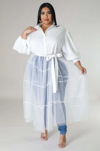 Detail of plus size white lantern sleeve shirt with sheer mesh overlay layering