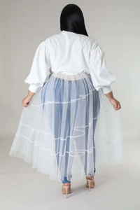 Rear view of plus size white mesh layered skirt with lantern sleeves and puffy design