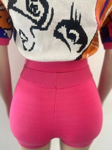 Macro shot of knitted fabric texture and artistic face jacquard pattern on high-stretch set