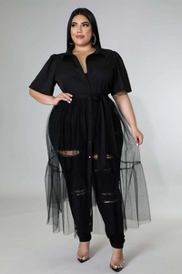Detail of plus size black chiffon mesh layered outfit with buttoned top and ripped leggings