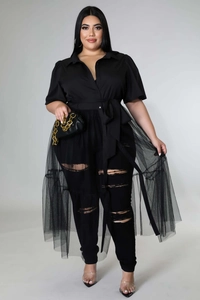 Detail view of plus size black mesh overlay dress and shirt collar with belt accessory