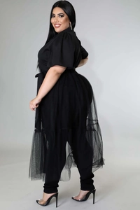 Detail view of plus size black chiffon outfit with layered mesh tulle skirt and V-neck top