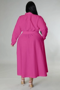 Back view of a plus size long sleeve shirt dress in vibrant rose pink with elastic waist
