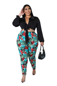 Detail of plus size long sleeve tie-front crop top with tropical floral print leggings