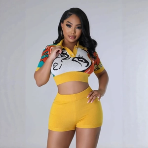 Women's yellow knit two-piece set featuring a short polo top with eye patterns and shorts