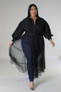 Detail of plus size black lantern sleeve blouse with mesh overlay and waist tie design
