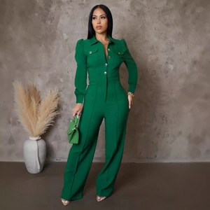 Dark green long sleeve jumpsuit with puff sleeves and wide leg pants for a stylish look