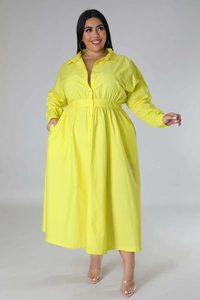Close-up of bright yellow plus size shirt dress with classic collar and button-up front