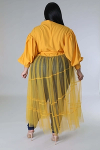 Rear view of plus size yellow dress featuring mesh puff sleeves and ruffled lace hem detail