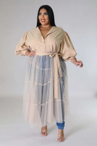 Close-up of beige plus size dress featuring mesh splicing, puff sleeves, and waist tie
