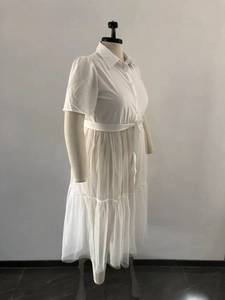 Detail of white plus size short sleeve dress with mesh splicing and waist tie design