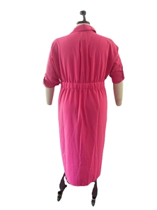Detail view of fuchsia long-sleeved shirt dress with elastic waist and back pleat detail
