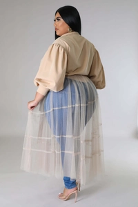 Detail of plus size khaki blouse with puff sleeves and layered mesh grid skirt overlay