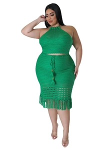 Close-up of green crochet knit set featuring fringe hem details and drawstring wood beads