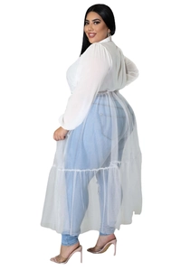 Detail view of plus size white chiffon long sleeve top with layered mesh skirt trim