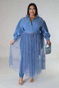 Detail of plus size blue dress featuring puff sleeves and mesh tulle layered skirt