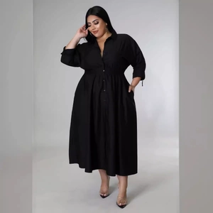 Plus size black long sleeve button-up shirt dress with a waist-cinching A-line silhouette